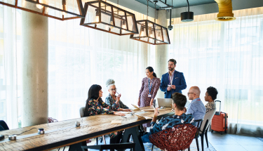 A group of people in a conference room