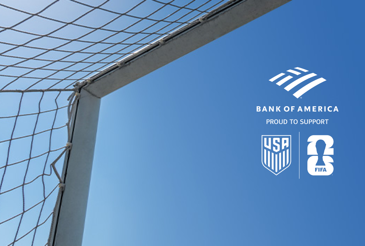 Blue skies beneath a soccer goal