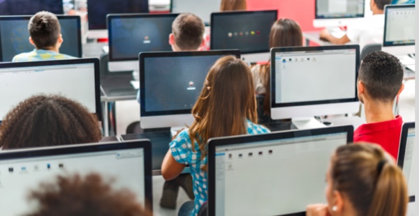 students in classroom on computers