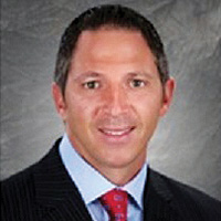 Headshot of Derek Comestro