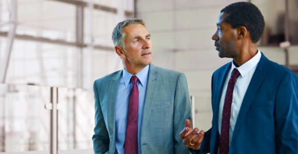 Two businessmen talking