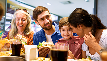 A family at a table enjoying a meal