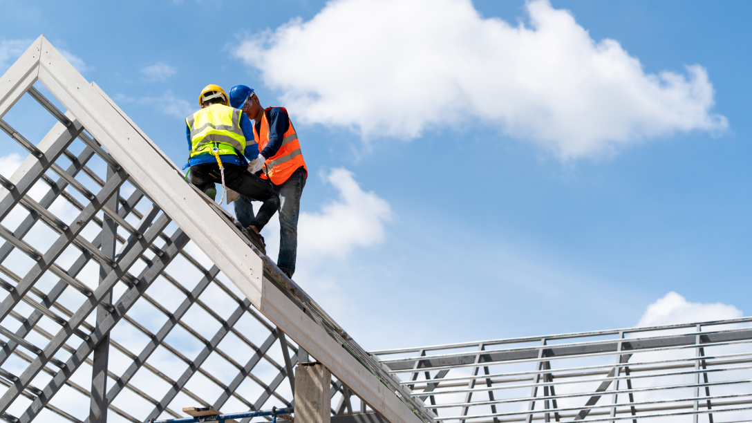 Construction workers on roof