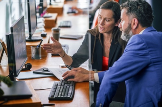 People looking at computer screen