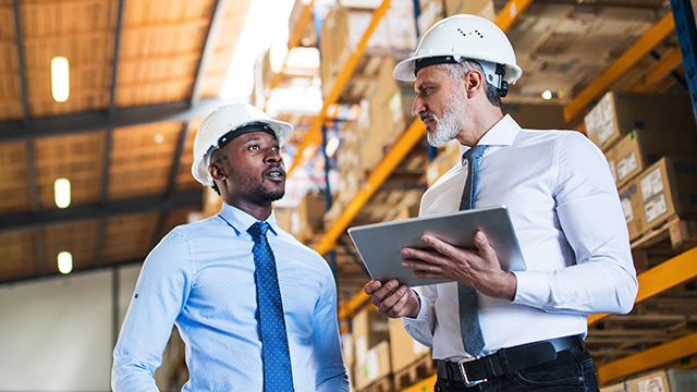 Two workers politely discussing politics