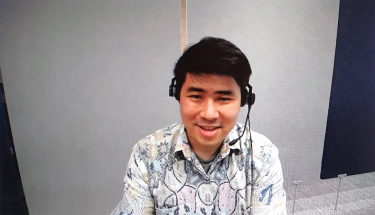 Mentoring youth on first job placement: A young man wearing a headset