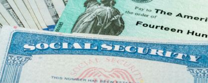 Social security card on top of money