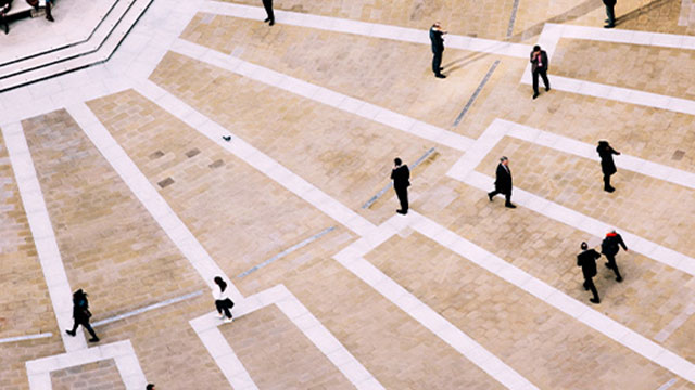 Aerial view of business people walking outside
